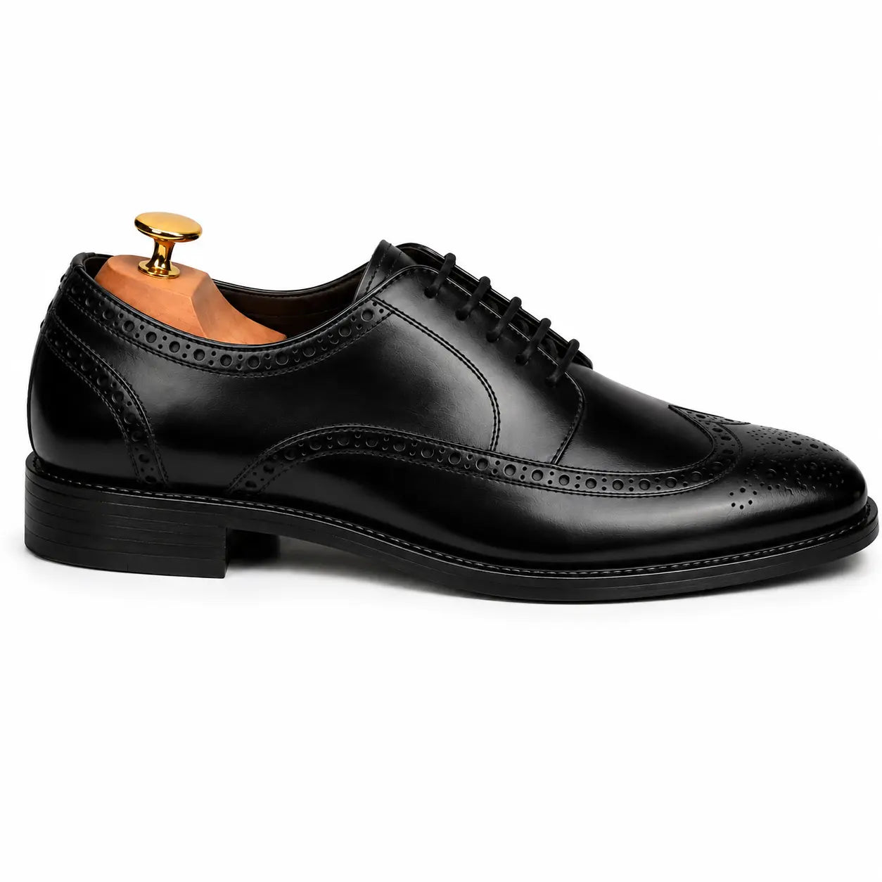 Side profile of the Mossverde Wingtip Brogue Oxford in black leather on white background