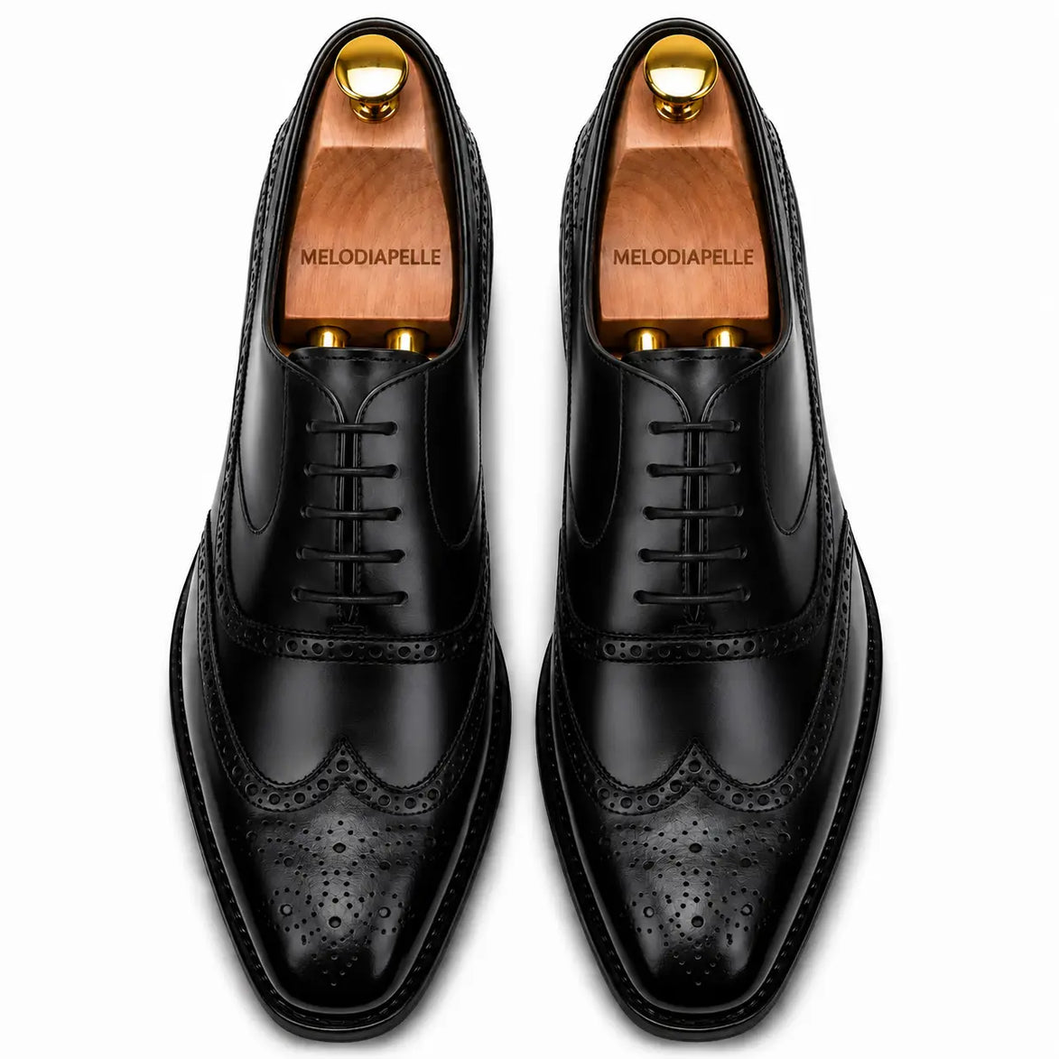 Melodiapelle Mossverde Wingtip Brogue Oxford in black leather, pair top-down view, handcrafted in Agra
