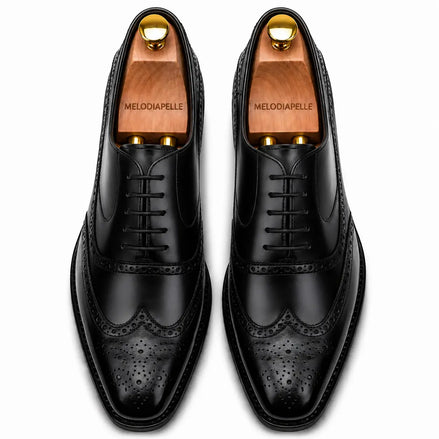 Melodiapelle Mossverde Wingtip Brogue Oxford in black leather, pair top-down view, handcrafted in Agra