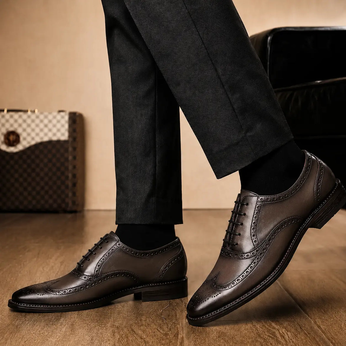 Melodiapelle Mossverde Wingtip Brogue Oxford in brown leather worn with formal trousers, on-feet shot