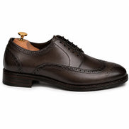 Side profile of the Mossverde Wingtip Brogue Oxford in brown leather on white background