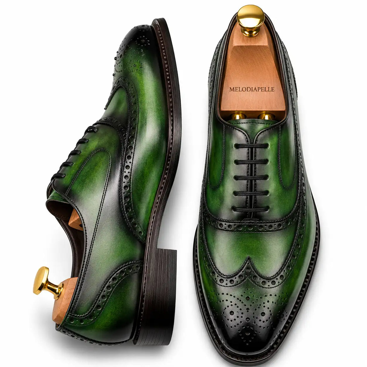 Sage green leather wingtip brogue Oxford, three-quarter angle showing heel and brogue detailing