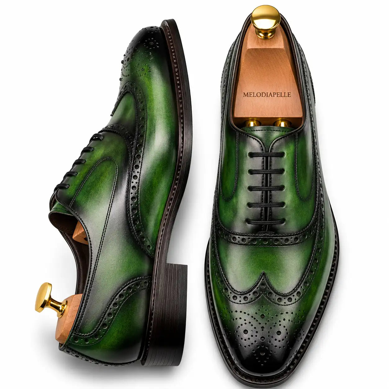 Sage green leather wingtip brogue Oxford, three-quarter angle showing heel and brogue detailing