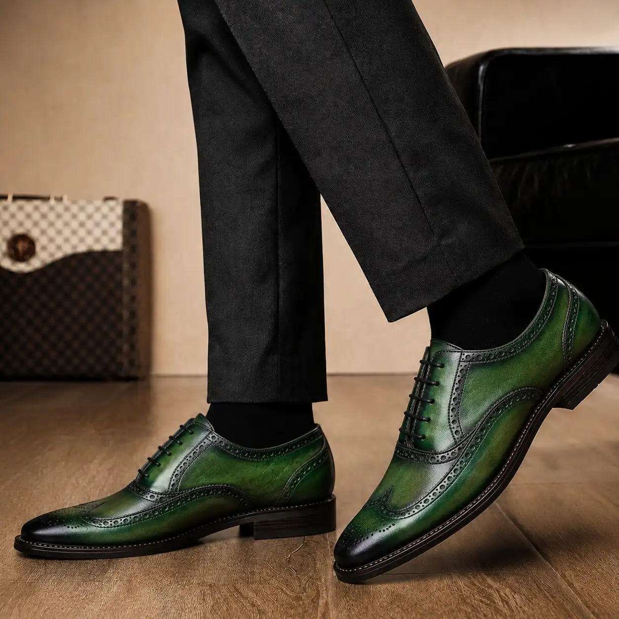 Melodiapelle Mossverde Wingtip Brogue Oxford in sage green leather worn with formal trousers, on-feet shot