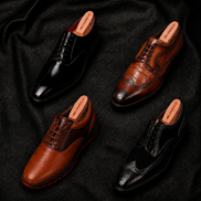 Melodiapelle Motif Golf Shoe collection in tan, brown and black leather, handcrafted golf shoes displayed together