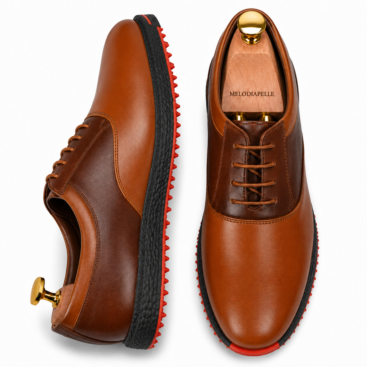 Two-tone tan and dark brown leather golf shoe, three-quarter angle showing heel and stitching detail