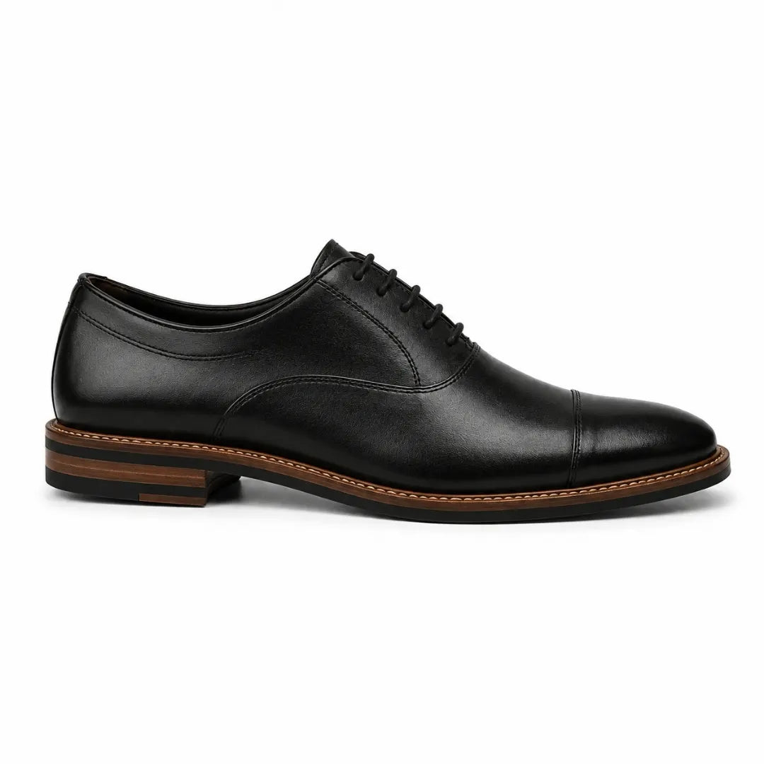 Side profile of the Mount Pleasant Oxford in black leather on white background