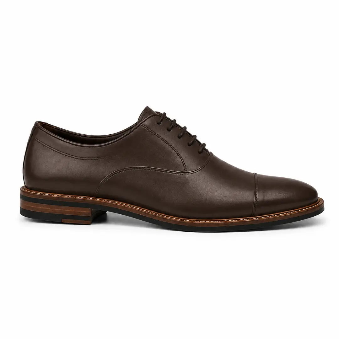 Side profile of the Mount Pleasant Oxford in dark brown leather on white background