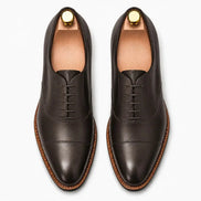 Melodiapelle Mount Pleasant Oxford in dark brown leather, pair top-down view, handcrafted in Agra