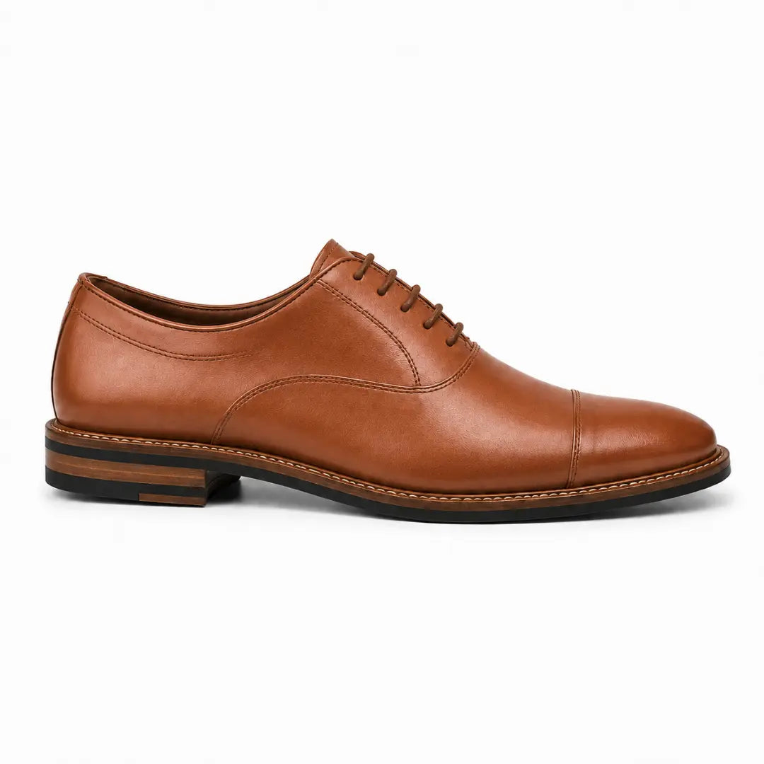 Side profile of the Mount Pleasant Oxford in tan leather on white background