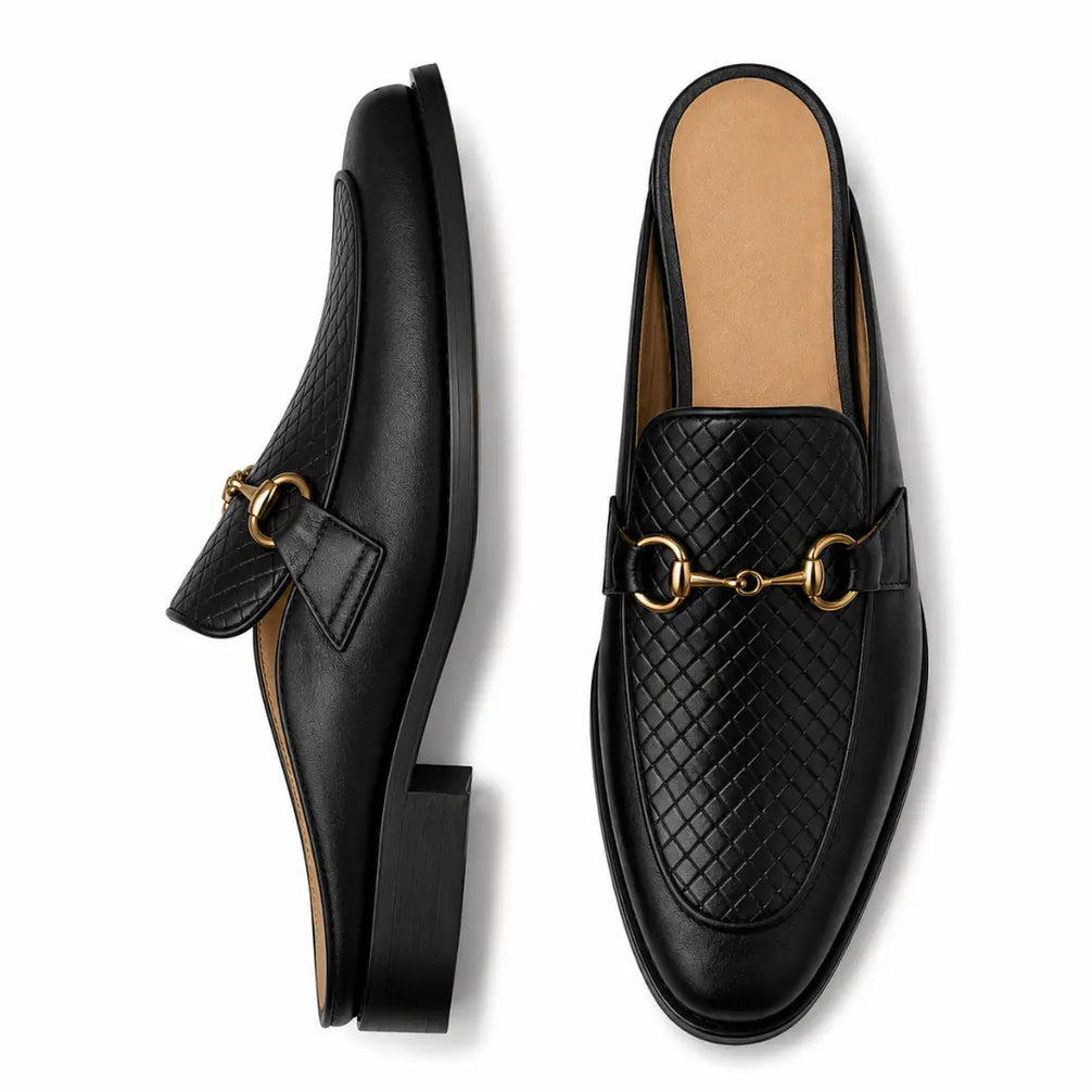 Black woven leather horsebit mule, three-quarter angle showing buckle and heel