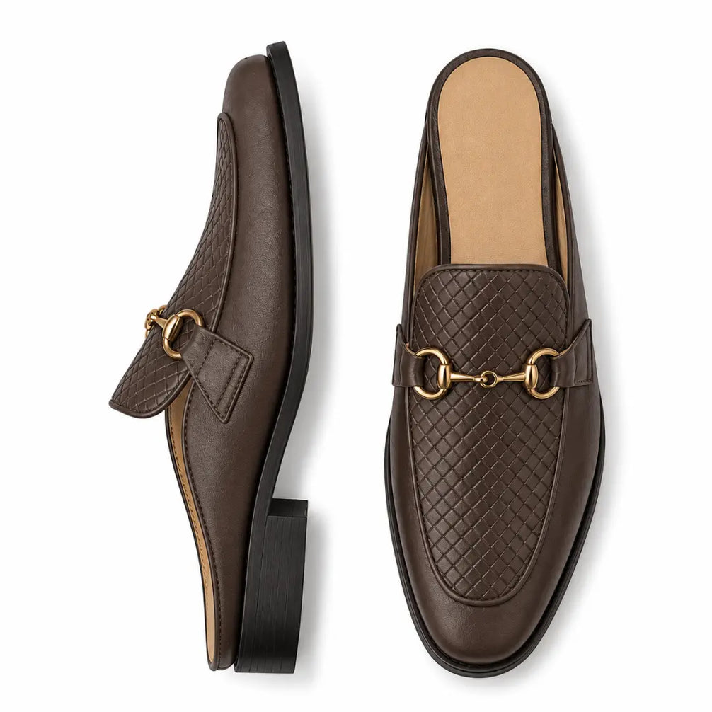 Dark brown woven leather horsebit mule, three-quarter angle showing buckle and heel