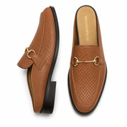 Tan woven leather horsebit mule, three-quarter angle showing buckle and heel