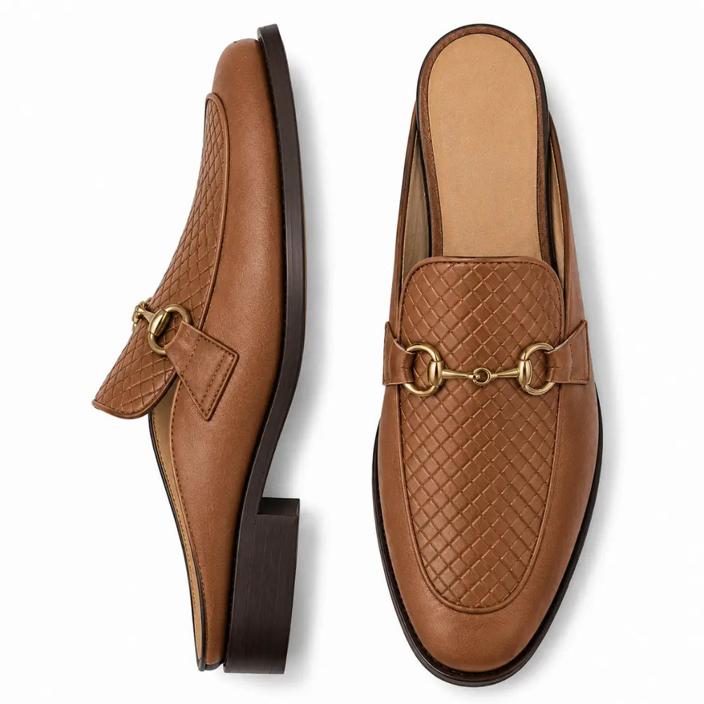 Tan woven leather horsebit mule, three-quarter angle showing buckle and heel