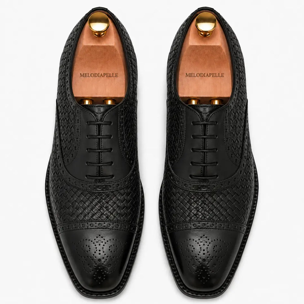 Melodiapelle Munich Woven Brogue Oxford in black leather, pair top-down view, handcrafted in Agra