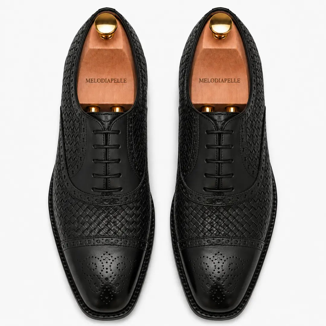 Melodiapelle Munich Woven Brogue Oxford in black leather, pair top-down view, handcrafted in Agra