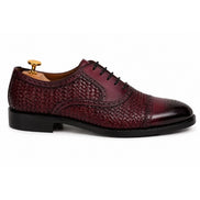 Side profile of the Munich Woven Brogue Oxford in bordeaux leather on white background