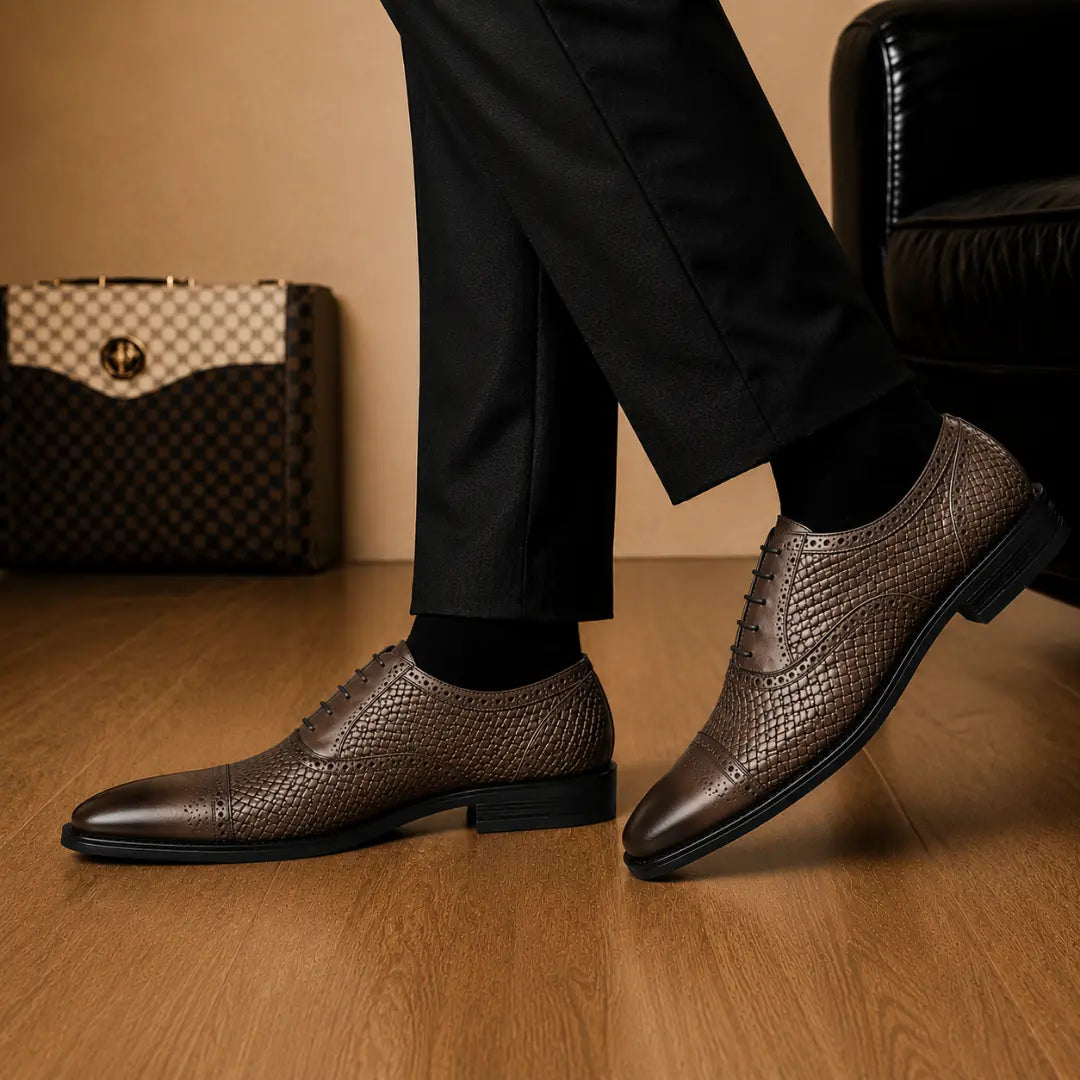 Melodiapelle Munich Woven Brogue Oxford in brown leather worn with formal trousers, on-feet shot