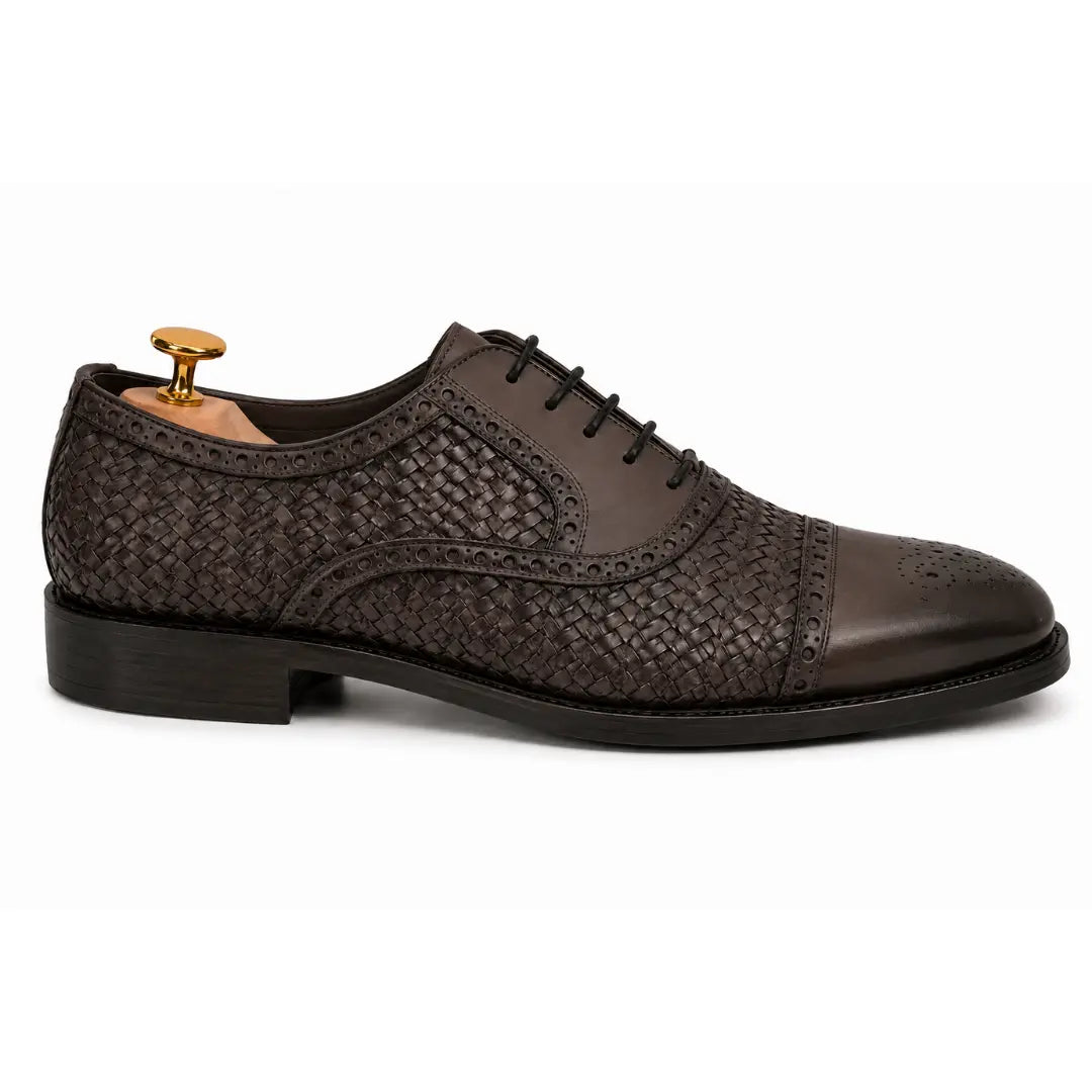 Side profile of the Munich Woven Brogue Oxford in brown leather on white background