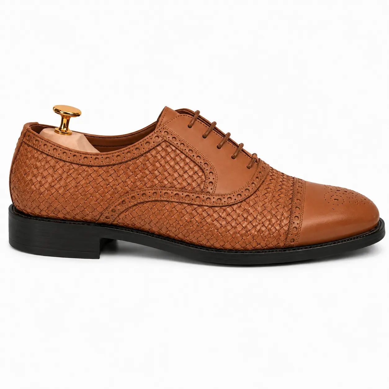 Side profile of the Munich Woven Brogue Oxford in tan leather on white background