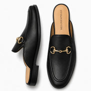 Black leather horsebit mule, three-quarter angle showing sole detailing