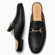 Black leather horsebit mule, three-quarter angle showing sole detailing