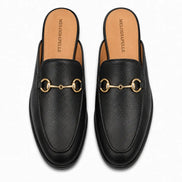 Melodiapelle Mustang Mule in black leather, pair top-down view, handcrafted in Agra