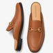 Tan leather horsebit mule, three-quarter angle showing sole detailing