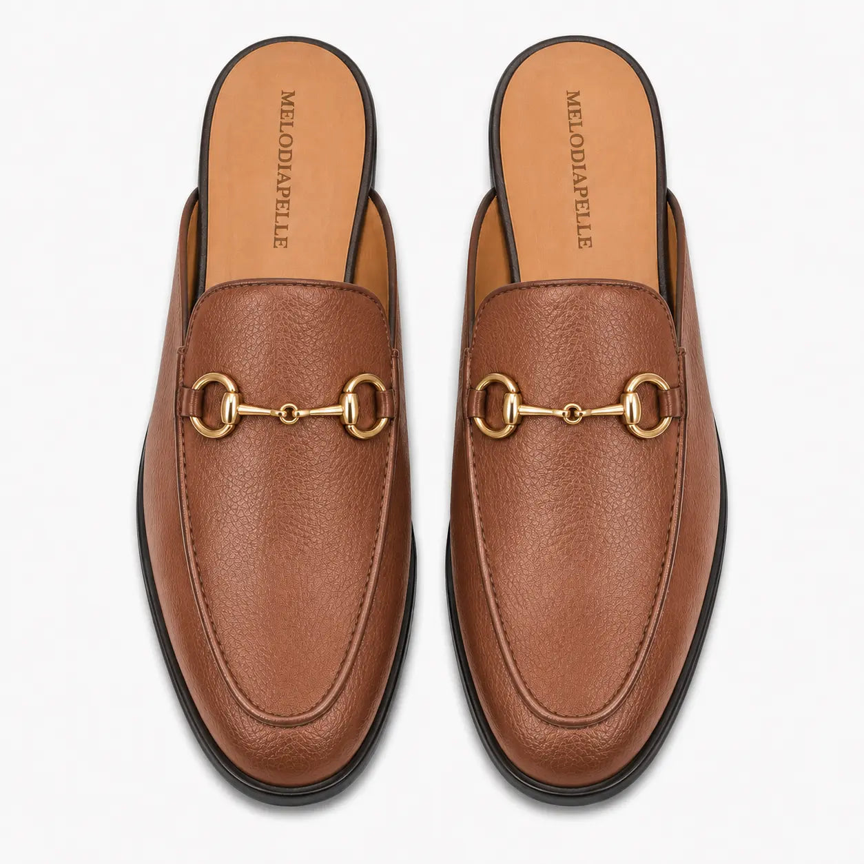 Melodiapelle Mustang Mule in tan leather, pair top-down view, handcrafted in Agra