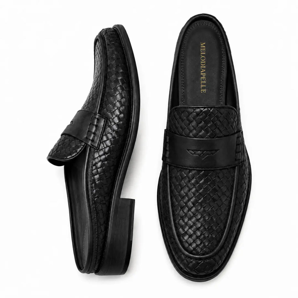Black woven leather penny mule, three-quarter angle showing heel and woven texture