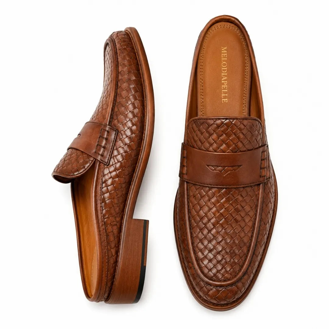 Cognac tan woven leather penny mule, three-quarter angle showing heel and woven texture