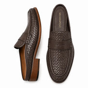 Dark brown woven leather penny mule, three-quarter angle showing heel and woven texture