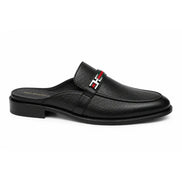 Side profile of the Sergio Mule in black leather on white background