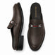 Dark brown leather bit-buckle mule loafer, three-quarter angle showing heel and buckle detailing