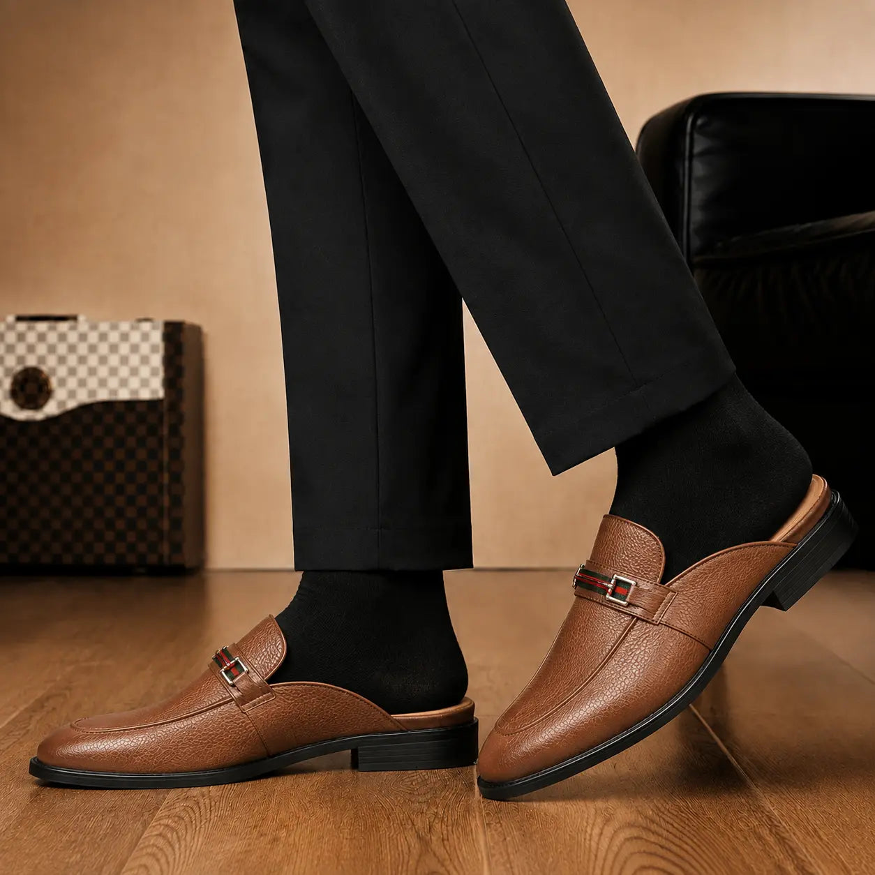 Melodiapelle Sergio Mule in tan leather worn with trousers, on-feet shot