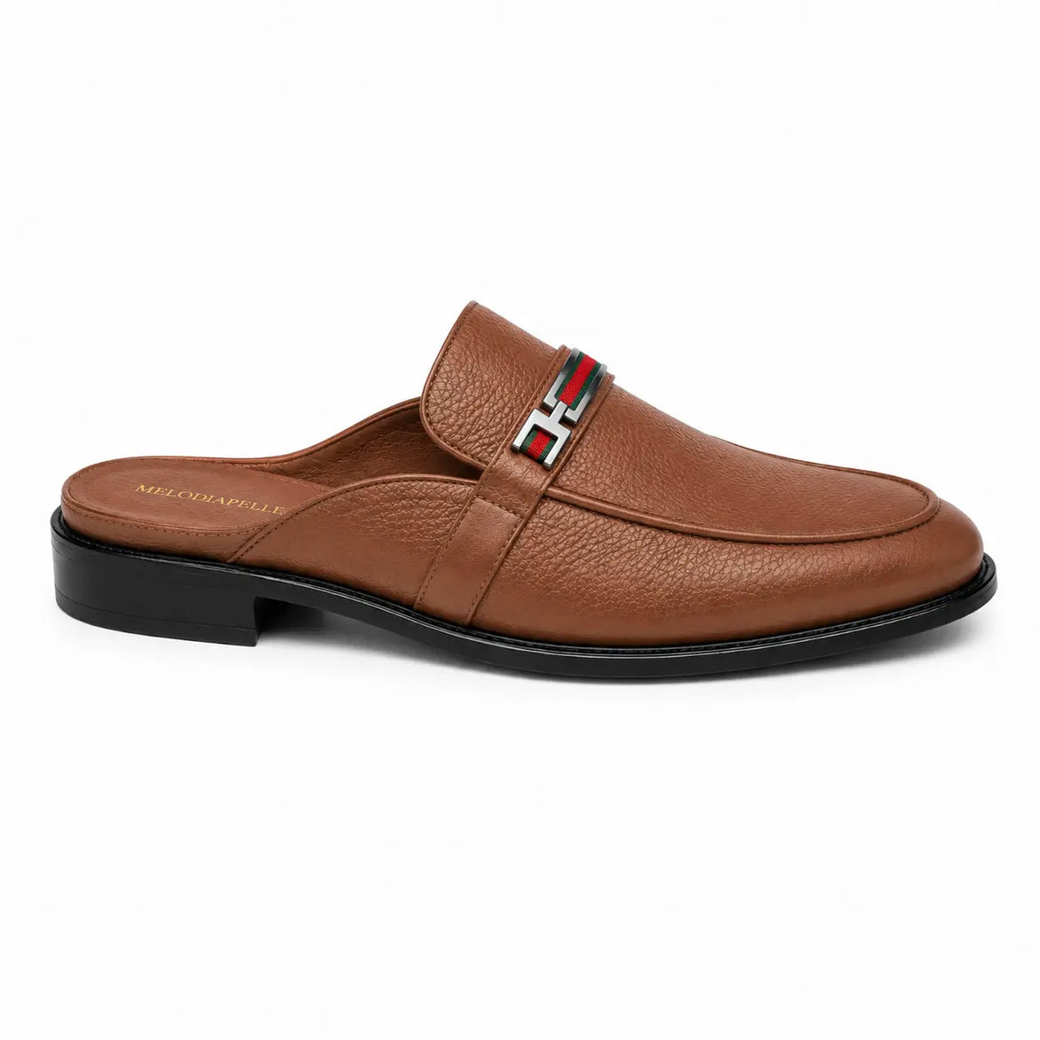 Side profile of the Sergio Mule in tan leather on white background